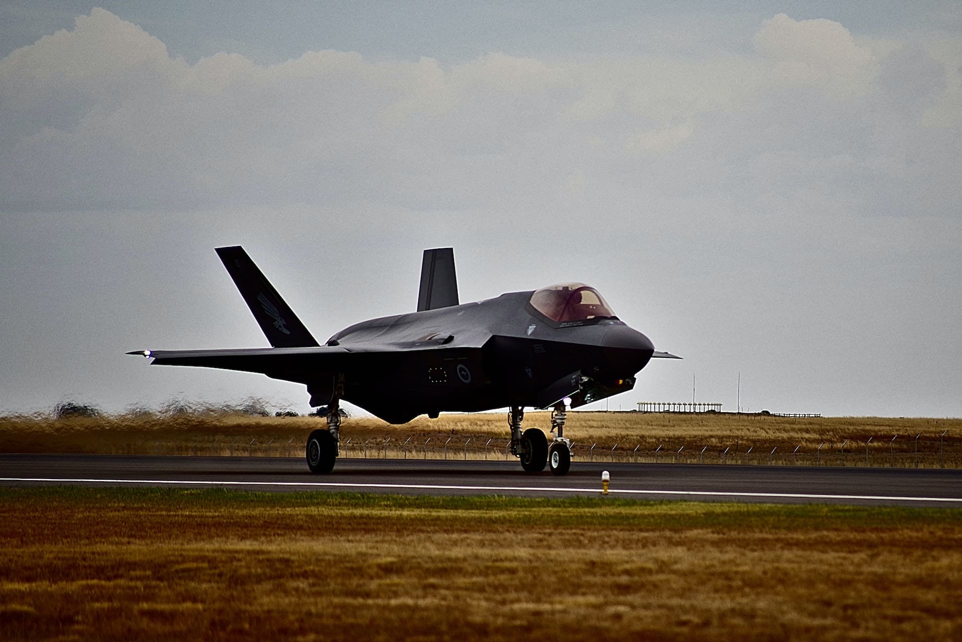 An F35 fighter jet on a runway.